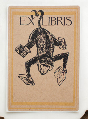 Ex Libris bookplate with a monkey illustration on a white surface
